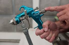 hand holding spray gun